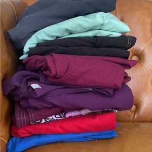 8 pairs of scrubs, some flare pants some joggers